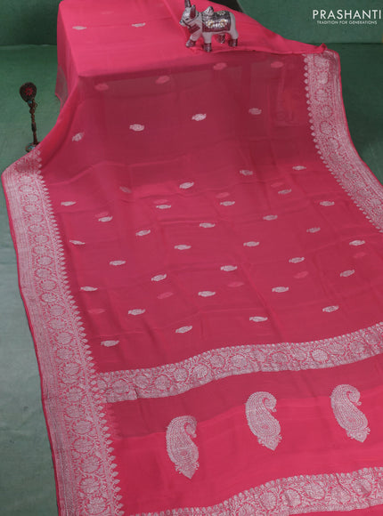 Banarasi chiffon saree peach pink with silver zari woven buttas and floral silver zari woven border