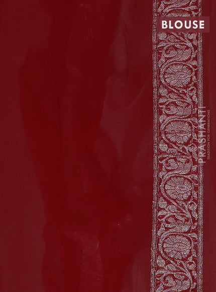 Banarasi chiffon saree light blue and kumkum red with silver zari woven buttas and floral silver zari woven border