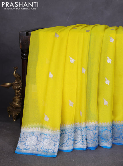 Banarasi chiffon saree lime yellow and cs blue with silver zari woven buttas and floral silver zari woven border