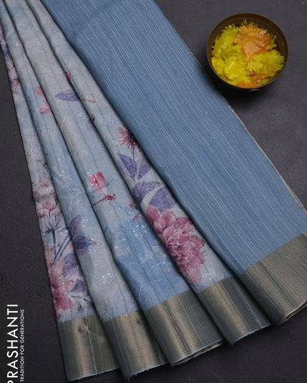 Semi matka saree pastel blue with allover floral prints & sequence work and zari woven border