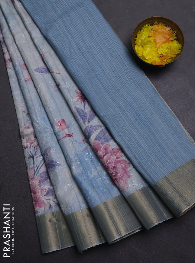 Semi matka saree pastel blue with allover floral prints & sequence work and zari woven border