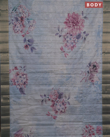 Semi matka saree pastel blue with allover floral prints & sequence work and zari woven border