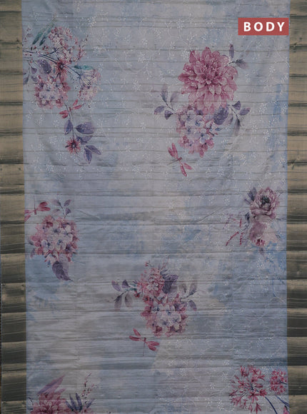 Semi matka saree pastel blue with allover floral prints & sequence work and zari woven border