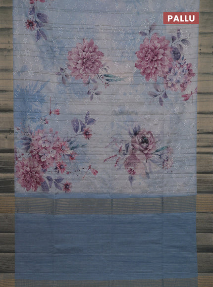 Semi matka saree pastel blue with allover floral prints & sequence work and zari woven border