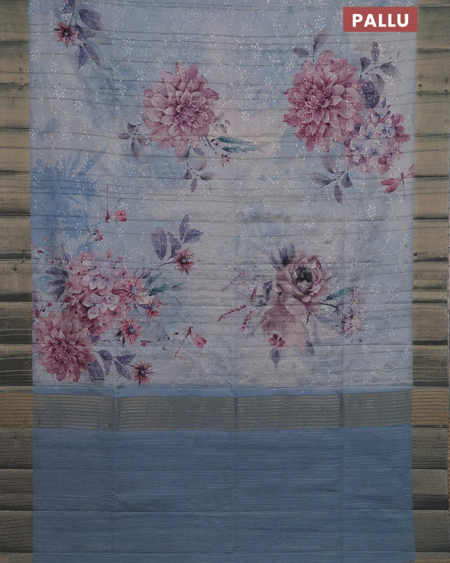 Semi matka saree pastel blue with allover floral prints & sequence work and zari woven border
