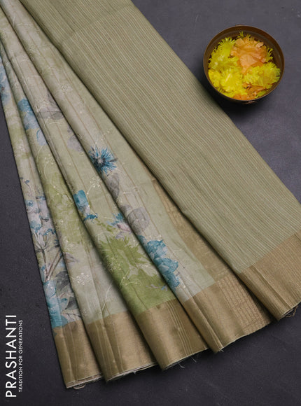 Semi matka saree pista green with allover floral prints & sequence work and zari woven border