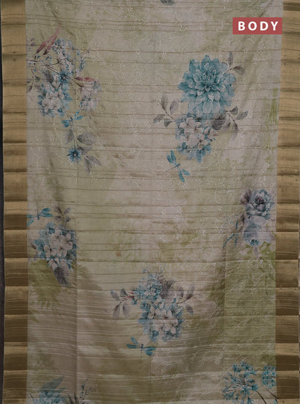 Semi matka saree pista green with allover floral prints & sequence work and zari woven border