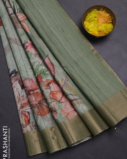 Semi matka saree pastel green with allover floral prints & sequence work and zari woven border