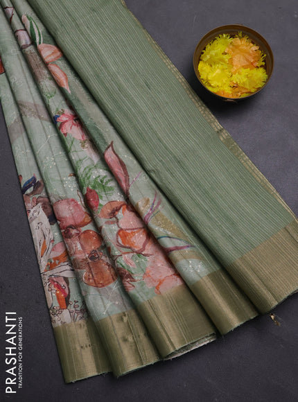 Semi matka saree pastel green with allover floral prints & sequence work and zari woven border