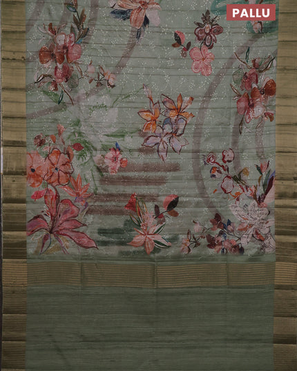Semi matka saree pastel green with allover floral prints & sequence work and zari woven border