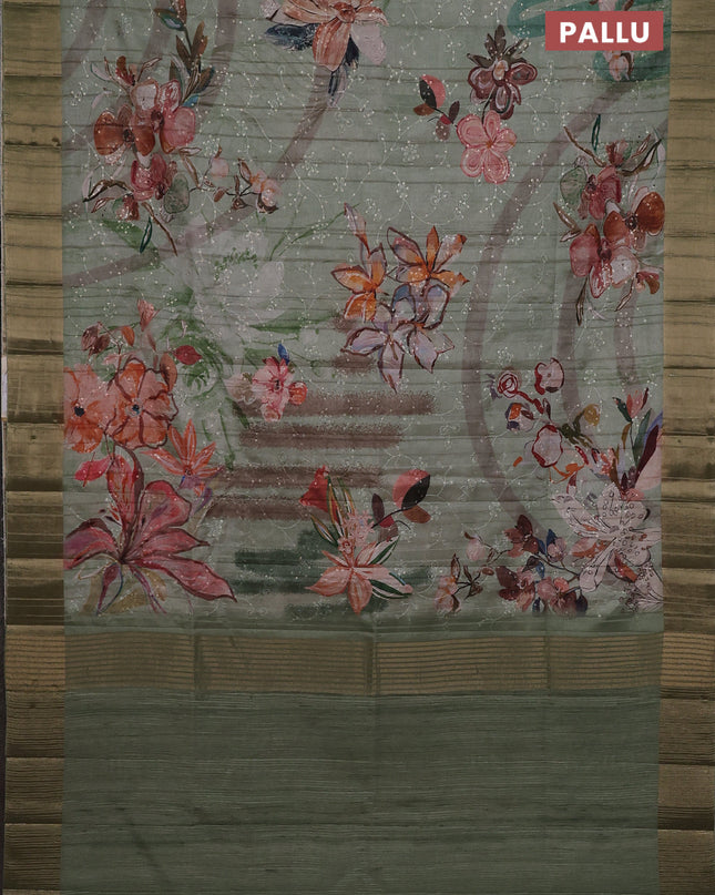 Semi matka saree pastel green with allover floral prints & sequence work and zari woven border