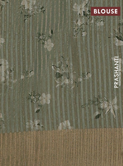 Semi matka saree pastel green with allover floral prints & sequence work and zari woven border