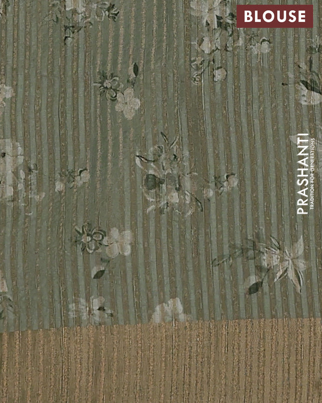 Semi matka saree pastel green with allover floral prints & sequence work and zari woven border