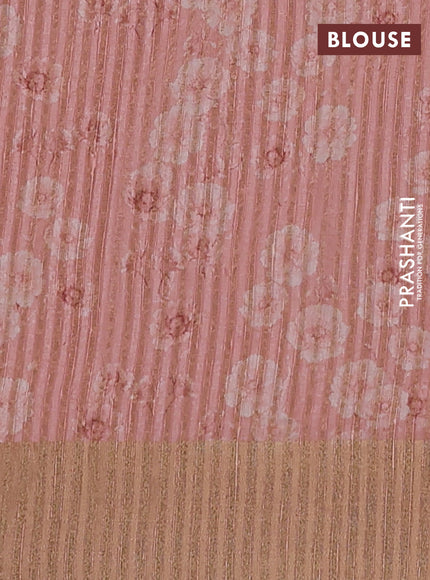 Semi matka saree peach shade with allover floral prints & sequence work and zari woven border