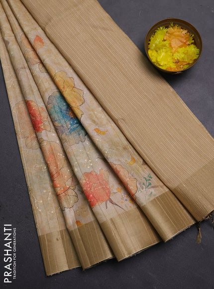 Semi matka saree beige and sandal with allover floral prints & sequence work and zari woven border