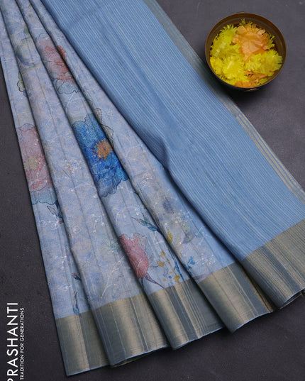 Semi matka saree pastel blue with allover floral prints & sequence work and zari woven border