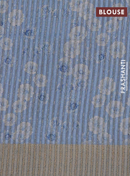 Semi matka saree pastel blue with allover floral prints & sequence work and zari woven border