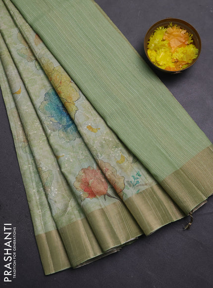 Semi matka saree pista green with allover floral prints & sequence work and zari woven border