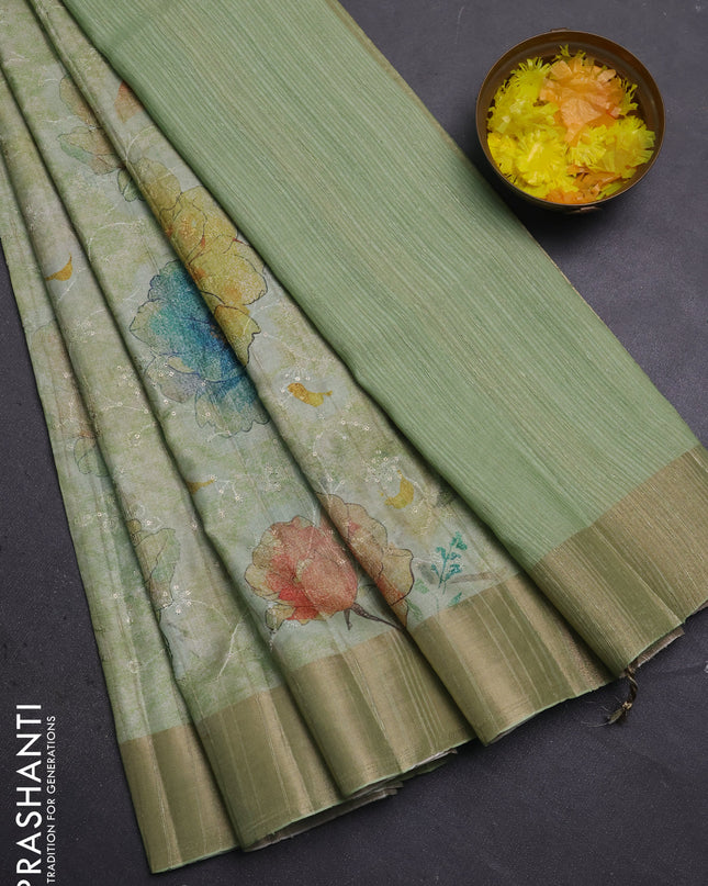 Semi matka saree pista green with allover floral prints & sequence work and zari woven border