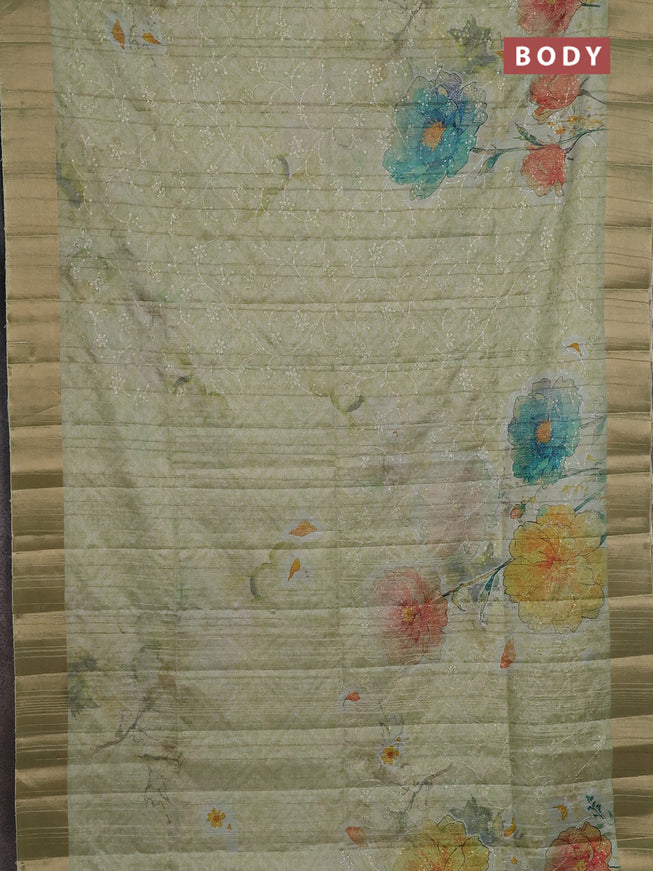 Semi matka saree pista green with allover floral prints & sequence work and zari woven border