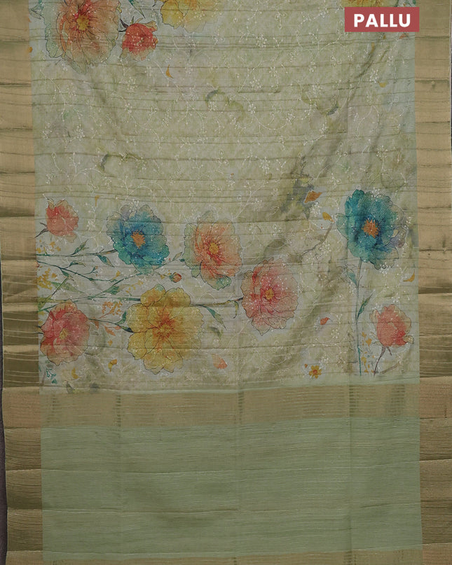 Semi matka saree pista green with allover floral prints & sequence work and zari woven border