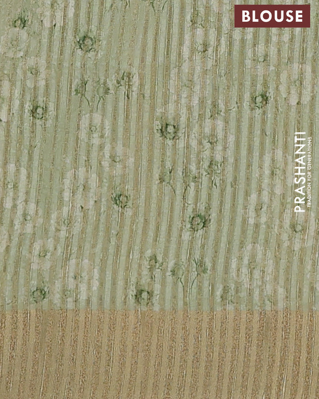 Semi matka saree pista green with allover floral prints & sequence work and zari woven border