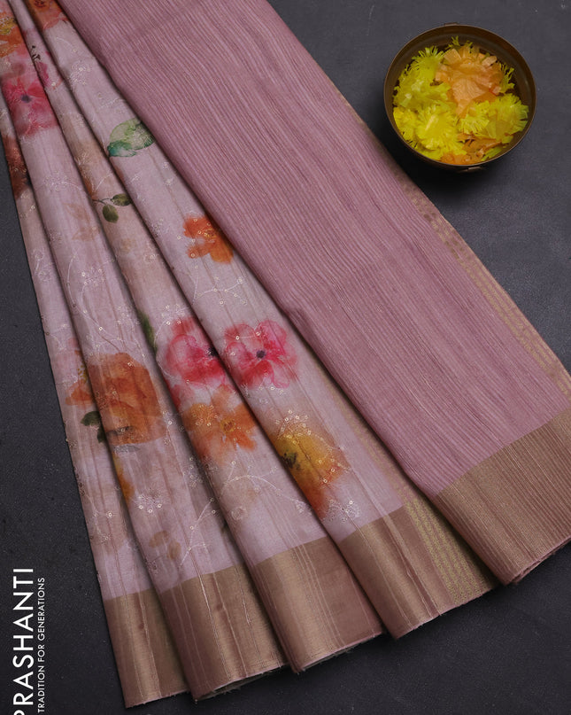 Semi matka saree peach shade with allover floral prints & sequence work and zari woven border