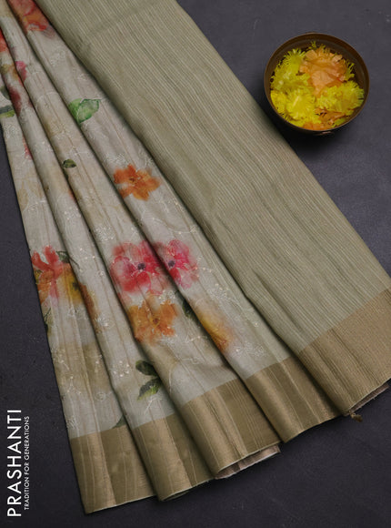 Semi matka saree pista green with allover floral prints & sequence work and zari woven border