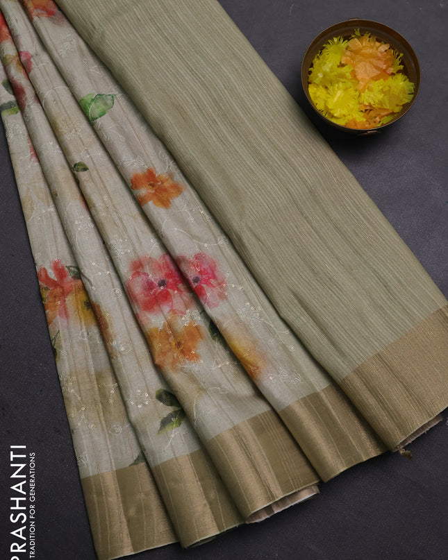 Semi matka saree pista green with allover floral prints & sequence work and zari woven border