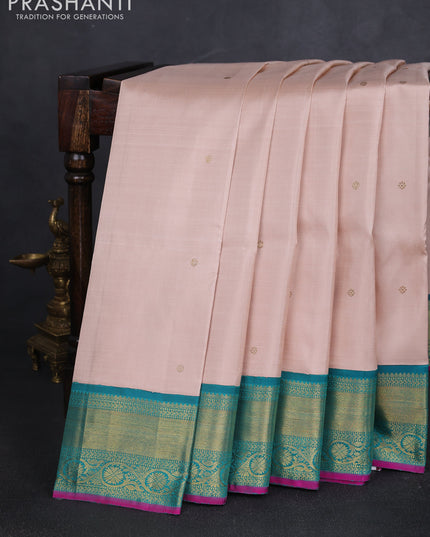 Pure kanchipuram silk saree pastel orange and teal green with zari woven buttas and zari woven korvai border