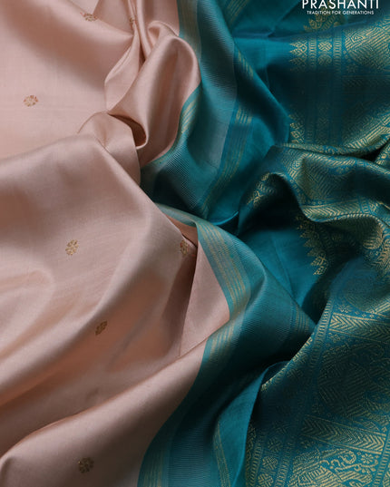 Pure kanchipuram silk saree pastel orange and teal green with zari woven buttas and zari woven korvai border