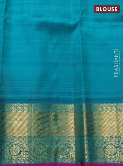 Pure kanchipuram silk saree pastel orange and teal green with zari woven buttas and zari woven korvai border