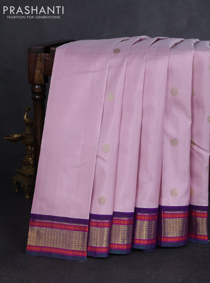 Pure kanchipuram silk saree pastel pink and violet with zari woven buttas and zari woven korvai border