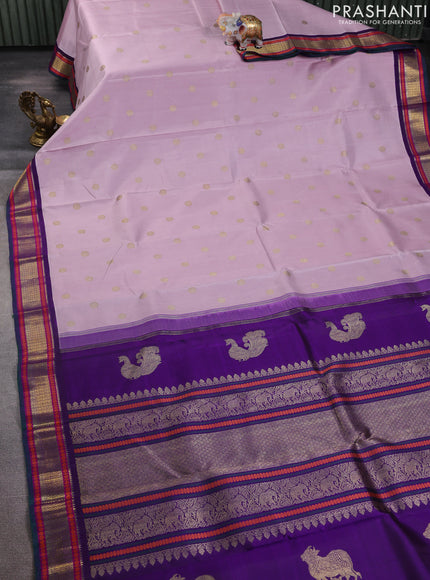 Pure kanchipuram silk saree pastel pink and violet with zari woven buttas and zari woven korvai border