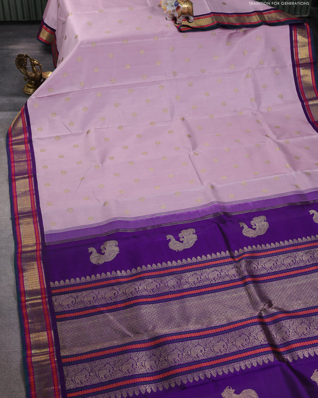 Pure kanchipuram silk saree pastel pink and violet with zari woven buttas and zari woven korvai border