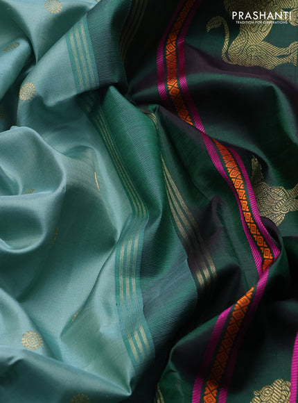 Pure kanchipuram silk saree pastel green and green coffee brown with zari woven buttas and zari woven korvai border