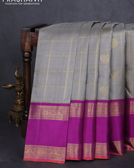 Pure kanchipuram silk saree grey and purple with allover zari checks & buttas and long rettapet zari woven korvai border
