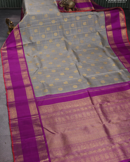 Pure kanchipuram silk saree grey and purple with allover zari checks & buttas and long rettapet zari woven korvai border