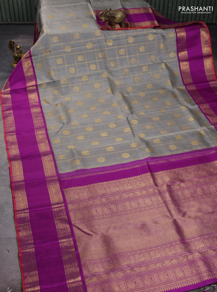 Pure kanchipuram silk saree grey and purple with allover zari checks & buttas and long rettapet zari woven korvai border