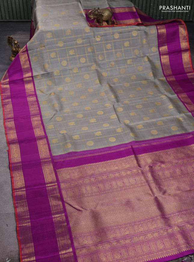 Pure kanchipuram silk saree grey and purple with allover zari checks & buttas and long rettapet zari woven korvai border