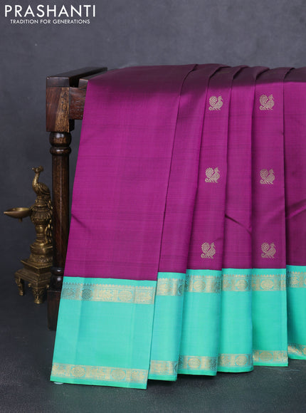 Pure kanchipuram silk saree purple and teal green with rudhraksha & annam zari woven buttas and rettapet zari woven korvai border