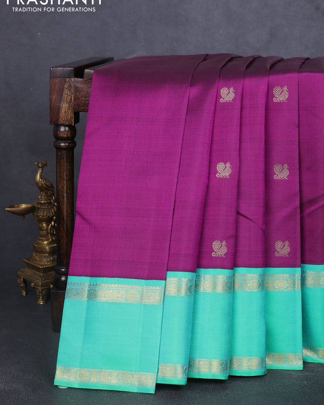 Pure kanchipuram silk saree purple and teal green with rudhraksha & annam zari woven buttas and rettapet zari woven korvai border
