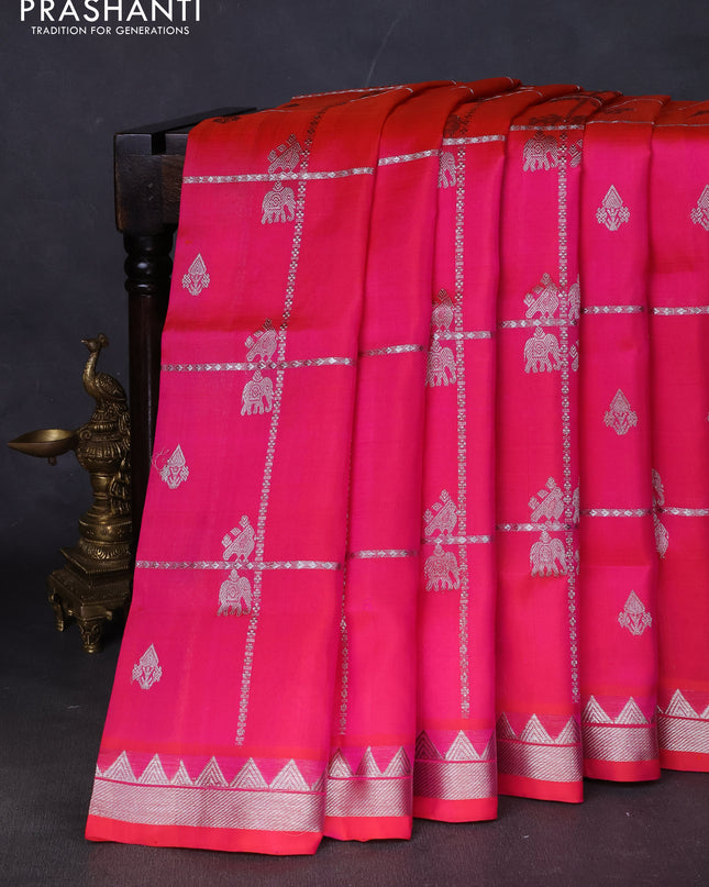 Venkatagiri silk saree dual shade of pinkish orange with allover silver zari checks & buttas and silver zari woven border