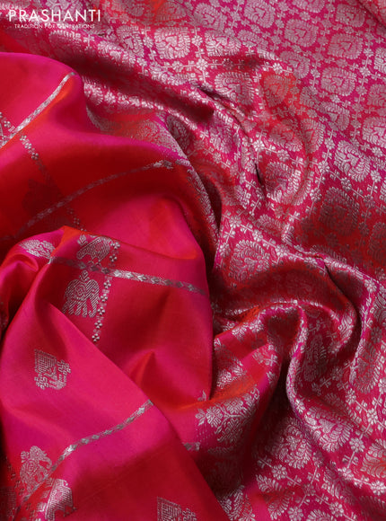 Venkatagiri silk saree dual shade of pinkish orange with allover silver zari checks & buttas and silver zari woven border