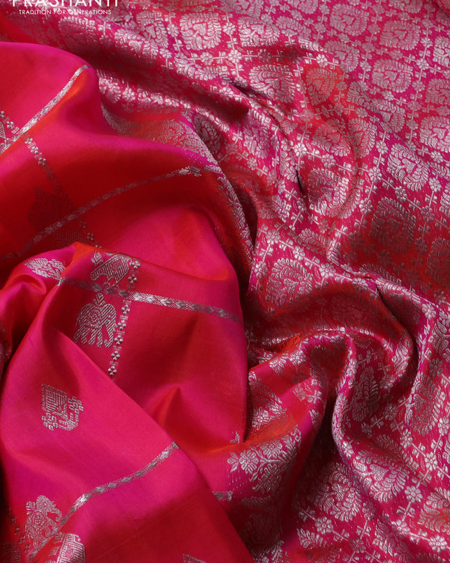 Venkatagiri silk saree dual shade of pinkish orange with allover silver zari checks & buttas and silver zari woven border