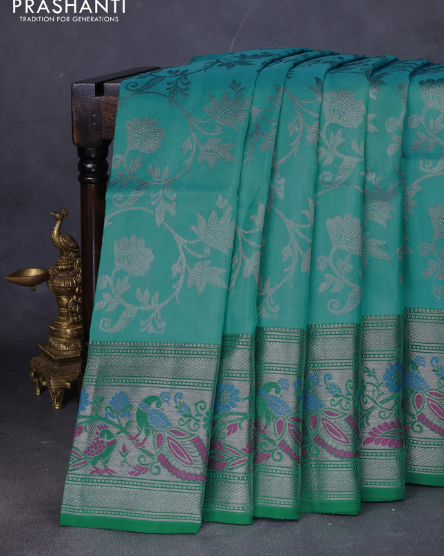 Venkatagiri silk saree light blue and green with allover silver zari weaves and silver zari woven peacock border