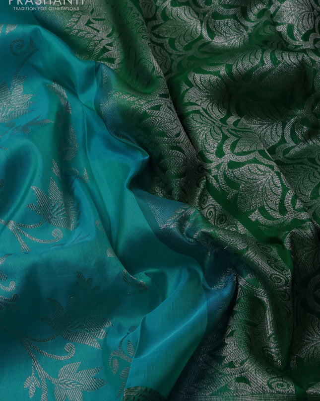 Venkatagiri silk saree light blue and green with allover silver zari weaves and silver zari woven peacock border