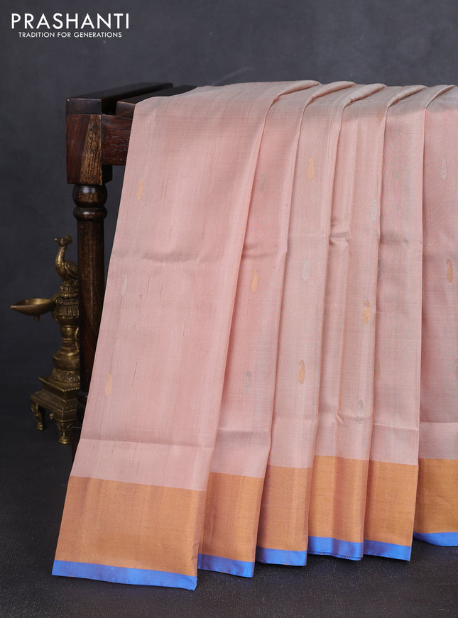 Pure uppada silk saree beige and cs blue with silver & gold zari woven paisley buttas and jamdhani design pallu