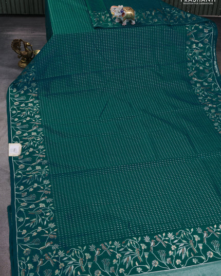 Art tussar saree teal green with allover zari woven butta weaves and jamdhani style border