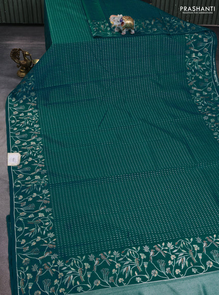Art tussar saree teal green with allover zari woven butta weaves and jamdhani style border